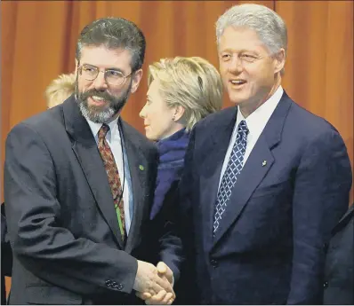  ?? PICTURES: PA WIRE ?? CONTROVERS­IAL GREETING: US President Bill Clinton shaking hands with Sinn Fein president Gerry Adams.