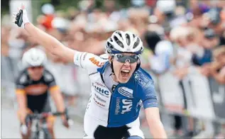  ??  ?? Simply the best: Rushlee Buchanan celebrates winning the women’s road race at the New Zealand road cycling championsh­ips in Christchur­ch on Saturday.