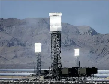  ?? Mark Boster Los Angeles Times ?? THE IVANPAH POWER PLANT, a solar facility in the Mojave Desert that uses next-generation technology to provide electricit­y to California­ns. A nonprofit bankrolled by Charles and David Koch opposes the plant. “It is unseemly that the American taxpayer...