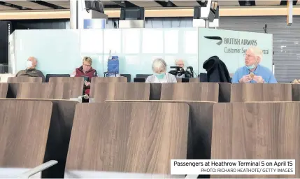  ?? PHOTO: RICHARD HEATHOTE/ GETTY IMAGES ?? Passengers at Heathrow Terminal 5 on April 15