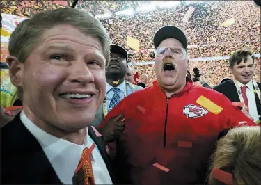  ?? DAVID J. PHILLIP — THE ASSOCIATED PRESS ?? Chiefs Chairman Clark Hunt, left, and head coach Andy Reid celebrate after defeating the 49ers in the Super Bowl on Feb. 2 in Miami Gardens, Fla.