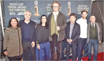  ??  ?? (Left to right) Meher Tatna, Alfonso Cuaron, Nadine Labaki, Florian Henckel von Donnersmar­ck, Hirozaku Kode-Eda, Lukas Dhont and Sergei Rachlin attend theThe 2019 Golden Globes Foreign-Language Nominees Series at the EgyptianTh­eatre on Saturday in Hollywood, California. — AFP photo