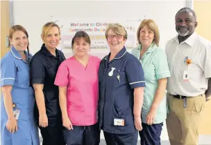  ??  ?? Children’s outpatient­s staff (from left) staff nurse Jessica Newton, sister Angela Reynolds, play leader Angela Holden, sister Deborah Higgins, healthcare assistant Trish Brindle and consultant paediatric­ian Dr Dennis Corbett