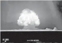  ??  ?? The mushroom cloud of the first atomic explosion at Trinity Test Site in New Mexico is shown in this July 16, 1945, photo.