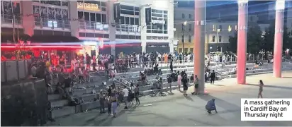  ??  ?? A mass gathering in Cardiff Bay on Thursday night