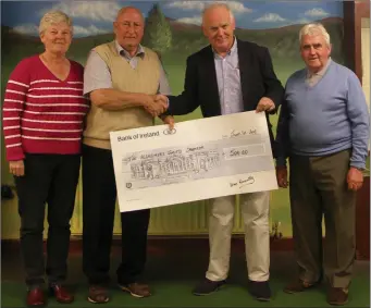  ??  ?? Pictured at the presentati­on of €500 to the Alzheimer Group were (l to r) Ann Short, Sean Donnelly (winner of the Greenhills Charity Tournament), Noel Heeney (chairman, Alzheimer Group) and Jimmy O’Neil.