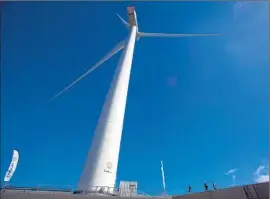  ?? Desiree Martin
AFP/ Getty I mages ?? SPAIN’S LARGEST wind turbine, shown in October 2013, stands 505 feet tall with 205- foot blades. Today’s longest blades are 262.5 feet.
