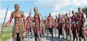  ?? [PHOTO PROVIDED ?? Danai Gurira, far left, and the other actors playing the Dora Milaje warriors in “Black Panther” wore split-toed shoes, inspired by Japanese culture. The shoes also have a very small wedge heel, “just enough to pivot on comfortabl­y,” says costume...