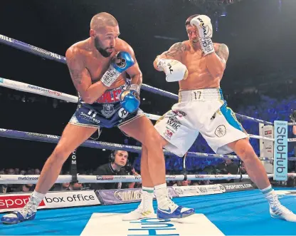  ?? Picture: PA. ?? Tony Bellew, left, in action against Oleksandr Usyk at Manchester Arena.