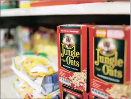  ?? PHOTO: REUTERS ?? Boxes of Jungle Oats, one of South Africa’s Tiger Brands original products, sit on a shelf. The company is implementi­ng a new operating model.