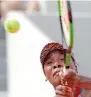  ?? AFP ?? Venus returns the ball to China’s Wang during their first round match. —