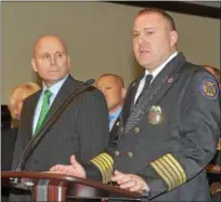  ?? PETE BANNAN — DIGITAL FIRST MEDIA ?? Chester County District Attorney Tom Hogan listens as West Chester Fire Chief Jonathan Stafford speaks, after department members were given a commendati­on for their actions at battling the inferno at the Barclay Friends Senior Living Center. The county...