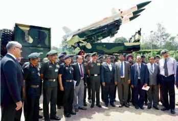  ??  ?? Army Chief Gen. Dalbir Singh Suhag and other officials during the induction ceremony of the Akash weapon system at Manekshaw Centre in New Delhi on Tuesday. —