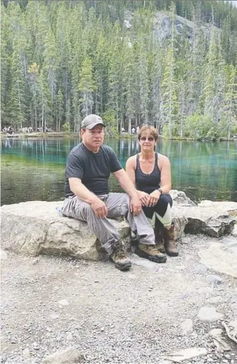  ??  ?? Darrell and Shirley Parker sit by the water at Grassi Lakes. Darrell suffered a heart attack at the trailhead.