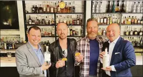  ?? Tony's at the J House / Contribute­d photo ?? Scott Norris, general manager at Tony's at the J House in Greenwich, with actors Aaron Paul and Bryan Cranston and Tony Capasso of Tony's. The actors were promoting their Dos Hombres mezcal.