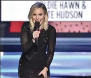  ?? PHOTO BY VINCE BUCCI — INVISION — AP ?? Host Kristen Bell speaks on stage at the 24th annual Screen Actors Guild Awards at the Shrine Auditorium & Expo Hall on Sunday, Jan. 21, in Los Angeles.