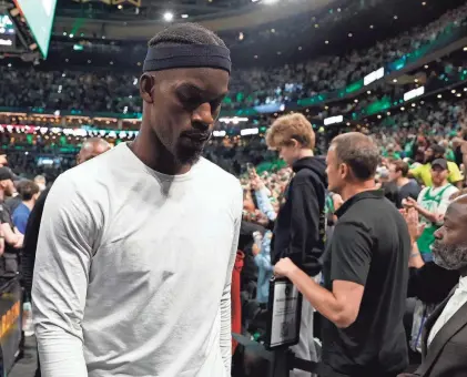  ?? WINSLOW TOWNSON/USA TODAY SPORTS ?? Miami Heat forward Jimmy Butler leaves the court after a loss to the Boston Celtics in Game 5 of the Eastern Conference finals on Thursday night at TD Garden in Boston.