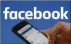  ?? NURPHOTO JAAP ARRIENS / ?? Facebook is expected to bring in $6.8 billion in digital video ad revenues this year, up 42 percent from 2017.
