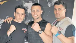  ?? / Jeff Ellis ?? Rowan Campbell, left, Kevin Lerena, and trainer Peter Smith who has made them champions despite the fact that they have no amateur background.