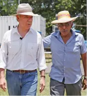  ?? — AP ?? Colombian President Juan Manuel Santos (left) with senior Farc leader Joaquin Gomez at a demobilisa­tion site in Fonseca, Colombia, on Tuesday.