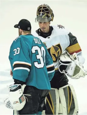  ?? STAN SZETO/USA TODAY ?? The Golden Knights’ Marc-Andre Fleury, receiving congratula­tions from the Sharks’ Aaron Dell, posted his fourth playoff shutout Sunday.