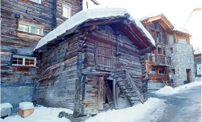  ??  ?? a quaint wooden barn in Zermatt Old town, Switzerlan­d.