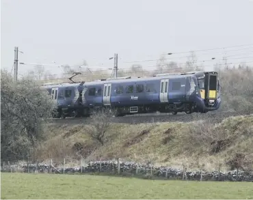  ?? PICTURE; JOHN DEVLIN ?? Scotrail has had to apologise to passengers for delays and cancellati­ons