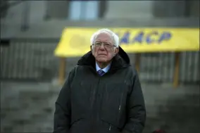  ?? MEG KINNARD- ASSOCIATED PRESS ?? Democratic presidenti­al candidate Sen. Bernie Sanders, I-Vt., stands at the South Carolina Statehouse before a Dr. Martin Luther King Jr. Day rally Monday, Jan. 20.