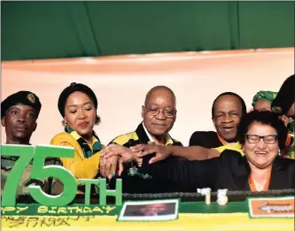  ??  ?? LET ‘EM EAT CAKE: President Jacob Zuma with wife Thobeka Madiba and Jesse Duarte cutting the cake during the president’s 75th birthday party at Kliptown Square.