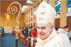  ??  ?? MASS: Cairns Bishop James Foley at St Monica’s Cathedral.