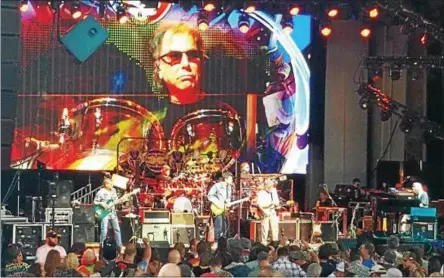  ?? FILE PHOTO ?? Percussion­ist Mickey Hart is shown on a large screen during a 2017 Dead & Co. concert at the Saratoga Performing Arts Center in Saratoga Springs. The band returns to SPAC Monday.