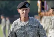  ?? AP Photo ??                                                                                                            McChrystal reviewing troops for the last time as he is honored at a retirement ceremony at Fort McNair in Washington.