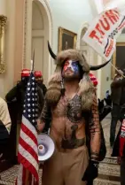  ?? Saul Loeb, Afp/getty Images ?? Jacob Anthony Chansley, a.k.a. the Qanon Shaman, enters the U.S. Capitol on Jan. 6 in Washington.