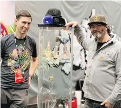  ?? NICK EAGLAND/PNG ?? Wes Kuitenbrou­wer, left, and Moss Tomlinson of Puff are keeping busy selling bongs, pipes, grinders and hightech gadgets.