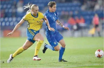  ?? RIGHT: — AFP ?? Germany’s Babett Peter (L) vies with Russia’s Elena Danilova during the Uefa Women’s Euro 2017 match at Galgenwaar­d Stadium in Utrecht. Sweden’s Stina Blacksteni­us (L) vies with Italy’s Barbara Bonansea in Doetinchem.