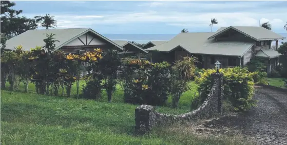  ??  ?? The six-bedroom home is in an exclusive enclave in the town of Savusavu and overlooks the ocean.