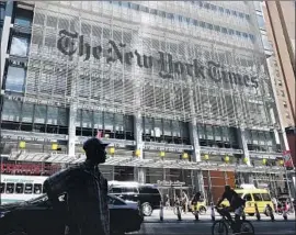  ?? Mike Coppola Getty I mages ?? AFTER Abu Huzayfah’s arrest, the New York Times opened a review of “Caliphate,” and the podcast has since been scrutinize­d by prominent media columnists.