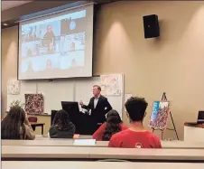  ?? Jacqueline Rabe Thomas / CTMirror.org ?? Gov. Ned Lamont during a visit to New Britain High School. Students listen to him both in-person and online on the screen overhead.