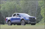  ?? MARC GRASSO — BOSTON HERALD ?? The 2020Ford Ranger has reintroduc­ed itself to the light truck market in a big way, with the same 2.3L EcoBoost four-cylinder engine as found in the Mustang, plus a smooth 10-speed transmissi­on that makes doing all your chores a dream.