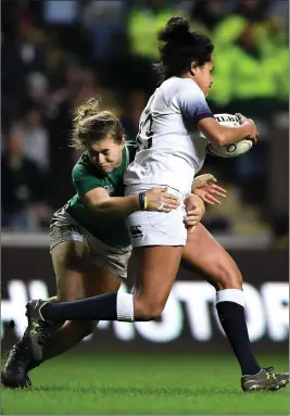  ??  ?? Ireland’s Katie Fitzhenry tackles Lagi Tuima of England during the Women’s Six Nations game at the Ricoh Arena in Coventry on Friday.