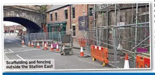  ?? ?? Scaffoldin­g and fencing outside the Station East
