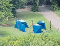  ??  ?? Police tents in Forbury Gardens