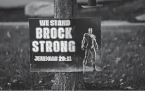  ?? PHOTOS BY ADAM CAIRNS/COLUMBUS DISPATCH ?? A Brockstron­g sign sits in the Canal Winchester front yard of Kristi and Terry Johnson. The initiative gave away its millionth dollar in October on what would’ve been Brock’s 21st birthday.
