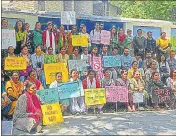 ?? HT PHOTO ?? Members of various women organisati­ons and civil societies during their protest in Dharamshal­a on Saturday.