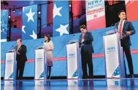  ?? BOB MILLER/THE NEW YORK TIMES ?? From left, former Gov. Chris Christie, former Gov. Nikki Haley, Gov. Ron DeSantis and Vivek Ramaswamy take the stage for the debate on Wednesday in Tuscaloosa, Ala.