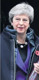  ??  ?? &gt; Prime Minister Theresa May