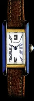  ??  ?? Cartier, montre-bracelet Petite Tank Allongée datant de 1969 : l’une des nombreuses déclinaiso­ns du design graphique et dépouillé imaginé lors de la Première Guerre mondiale.