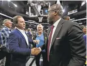  ?? JOSE CARLOS FAJARDO/STAFF ?? CEO Joe Lacob, left, is quite happy with the job interim head coach Mike Brown has done substituti­ng for Steve Kerr, who will return to the bench when he’s well enough.