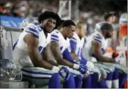  ?? JAE C. HONG — THE ASSOCIATED PRESS ?? Dallas Cowboys running back Rod Smith sits on the bench during their loss against the Los Angeles Rams in an NFL divisional football playoff game Saturday in Los Angeles.