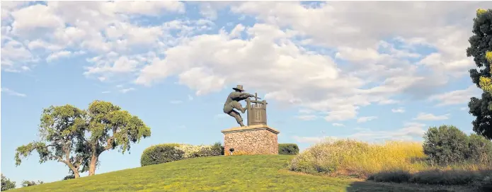  ??  ?? IN GOOD TASTE: The ‘Grape Crusher’ sculpture created by artist Gino Miles is dedicated to vineyard workers in honour of 200 years of grape growing in the Napa Valley wine region in Napa, California.